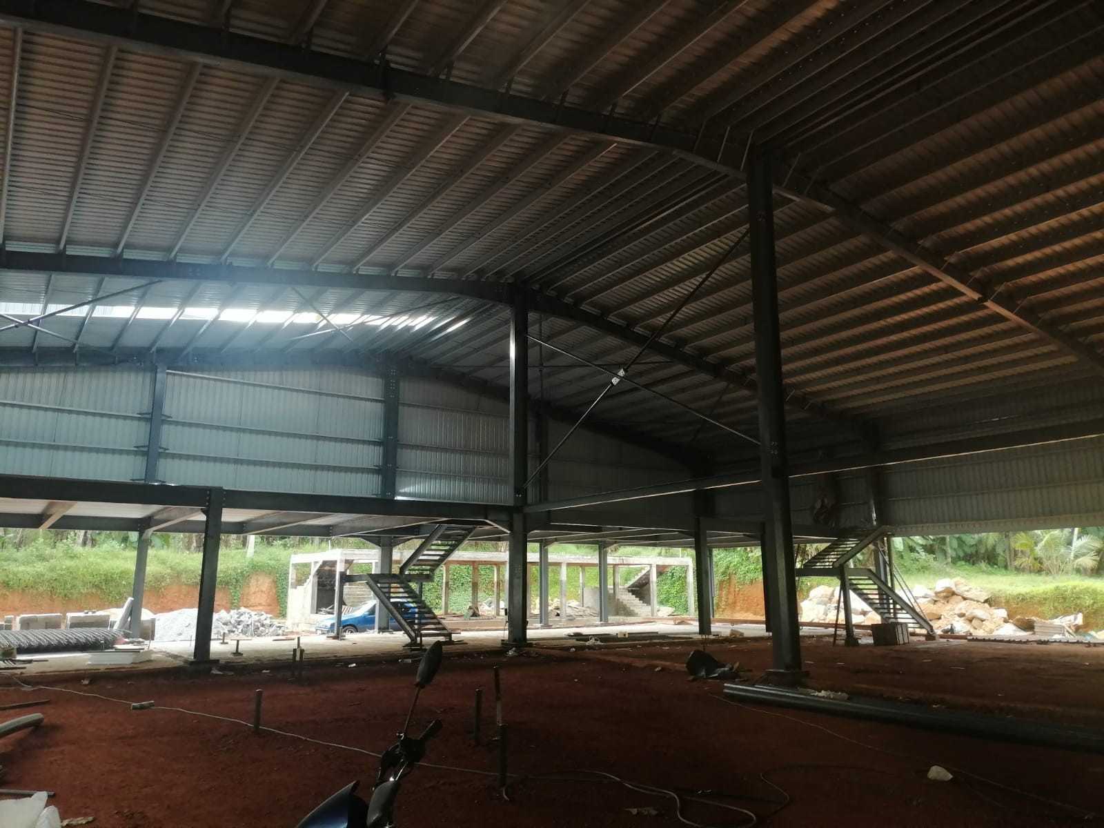 Interior view of the Britannia Packaging building showing steel columns and roof structure