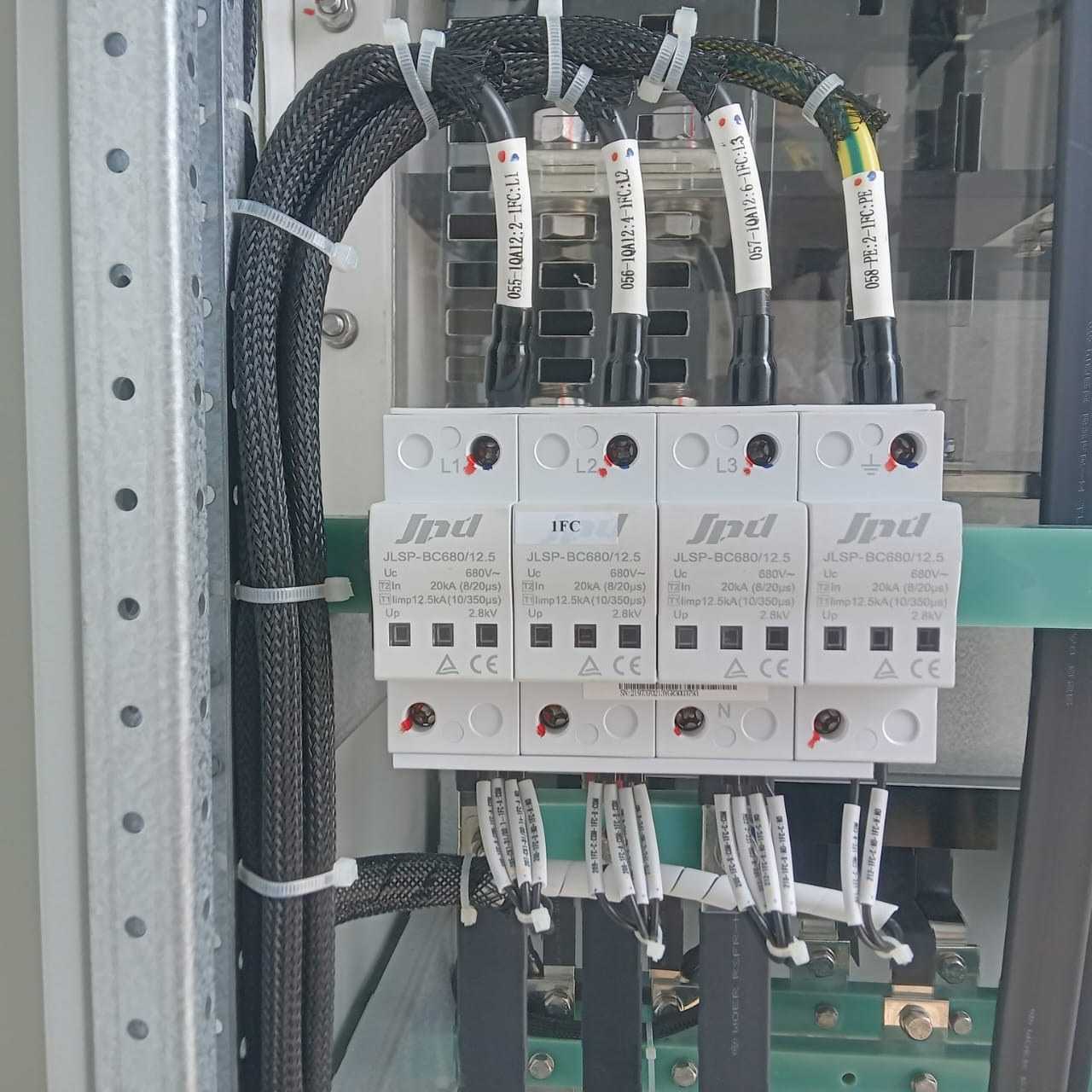 Surge protection devices and labeled wiring inside the Rathgama Solar electrical panel