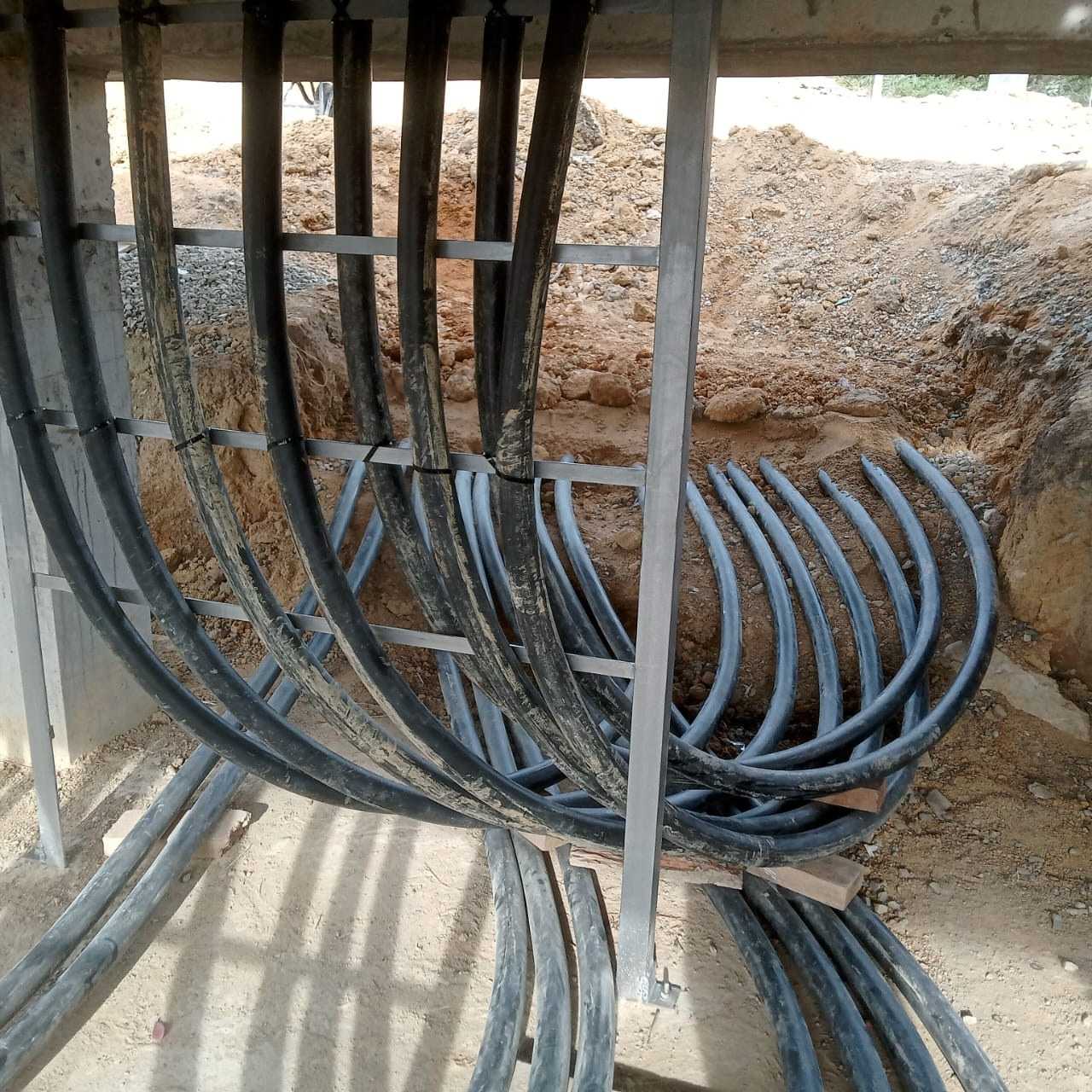Heavy-duty power cables routed through a support frame at Rathgama Solar